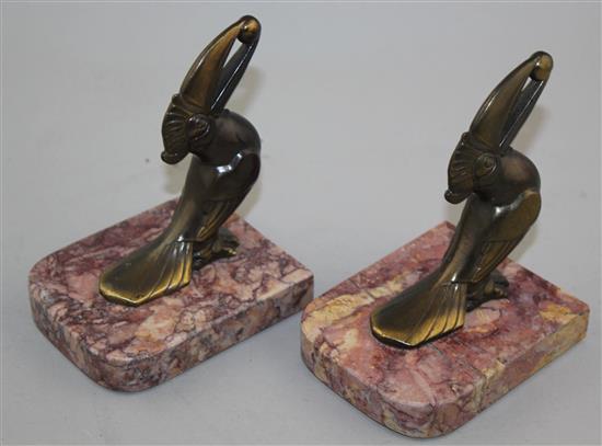 A pair of heron bookends & pair toucan bookends